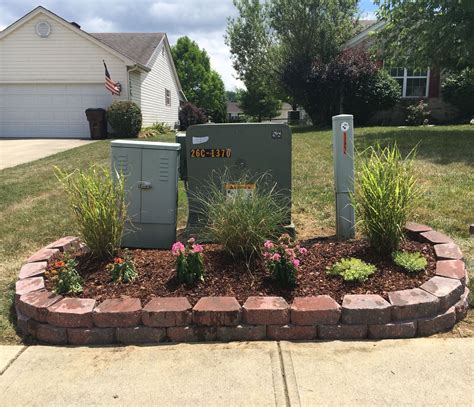 clever ways to hide electrical box|hiding utility boxes in garden.